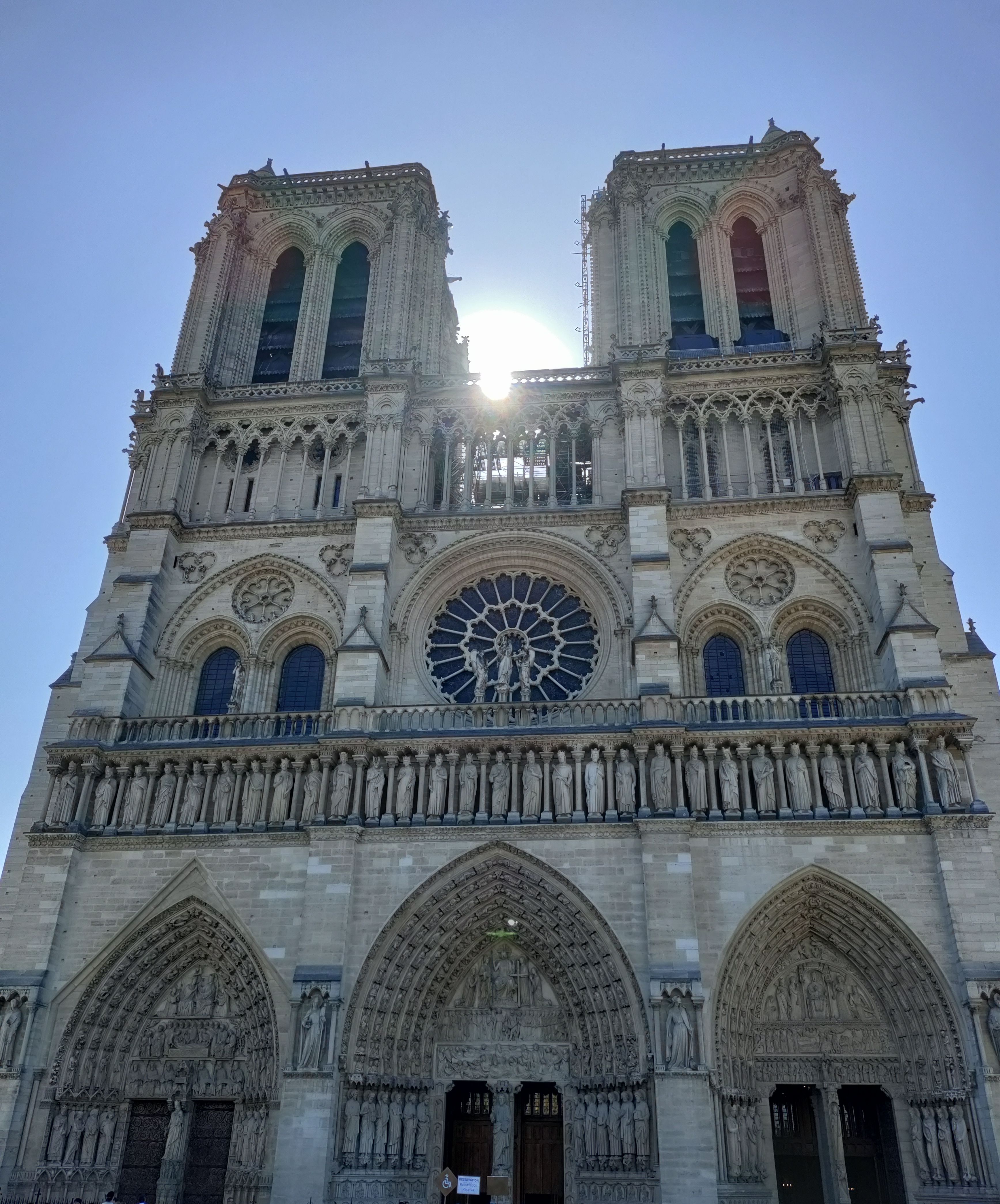 The morning sun rising over Notre Dame cathedral.