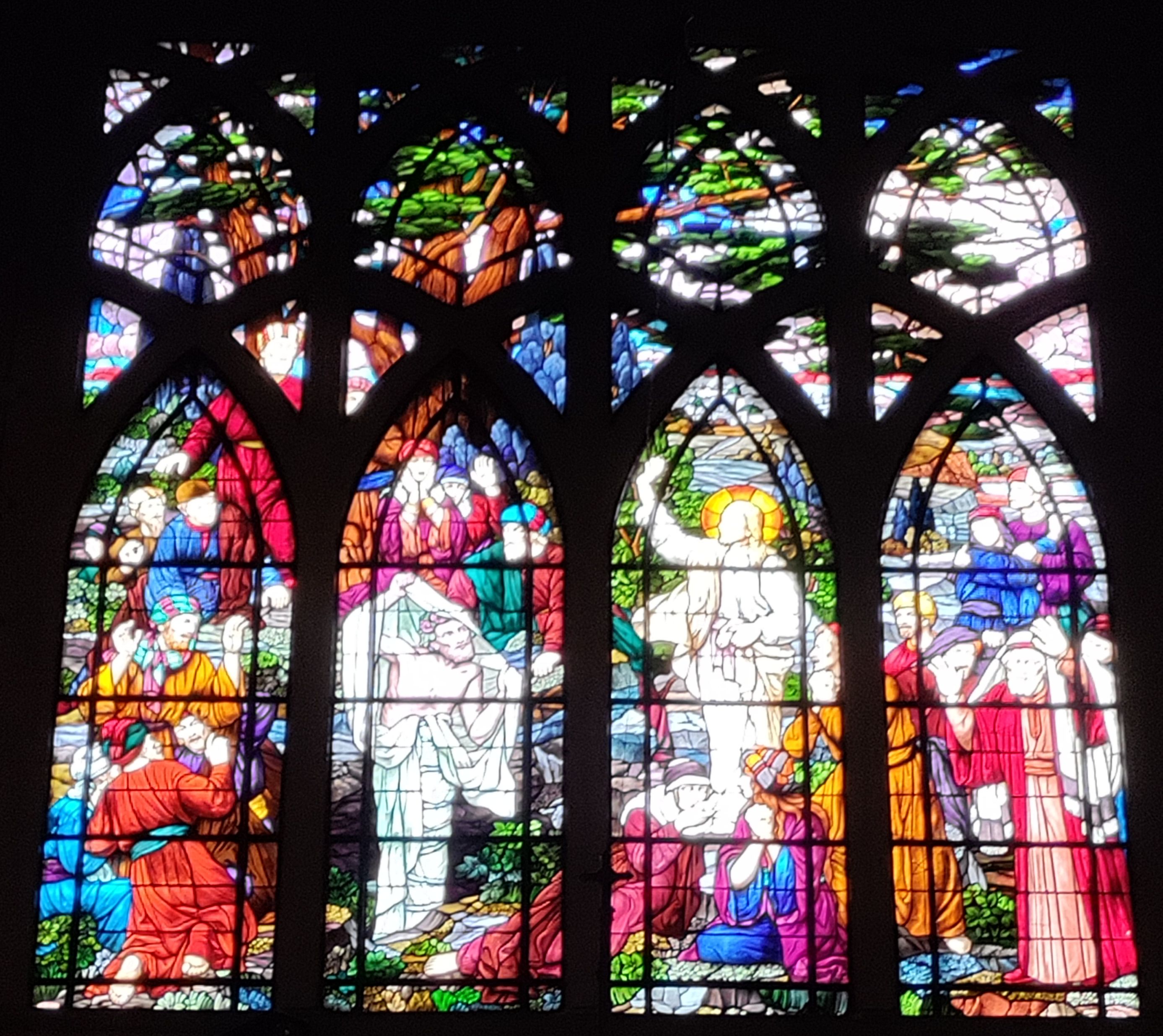 Stained glass window inside Saint Jean de Montmartre Church.