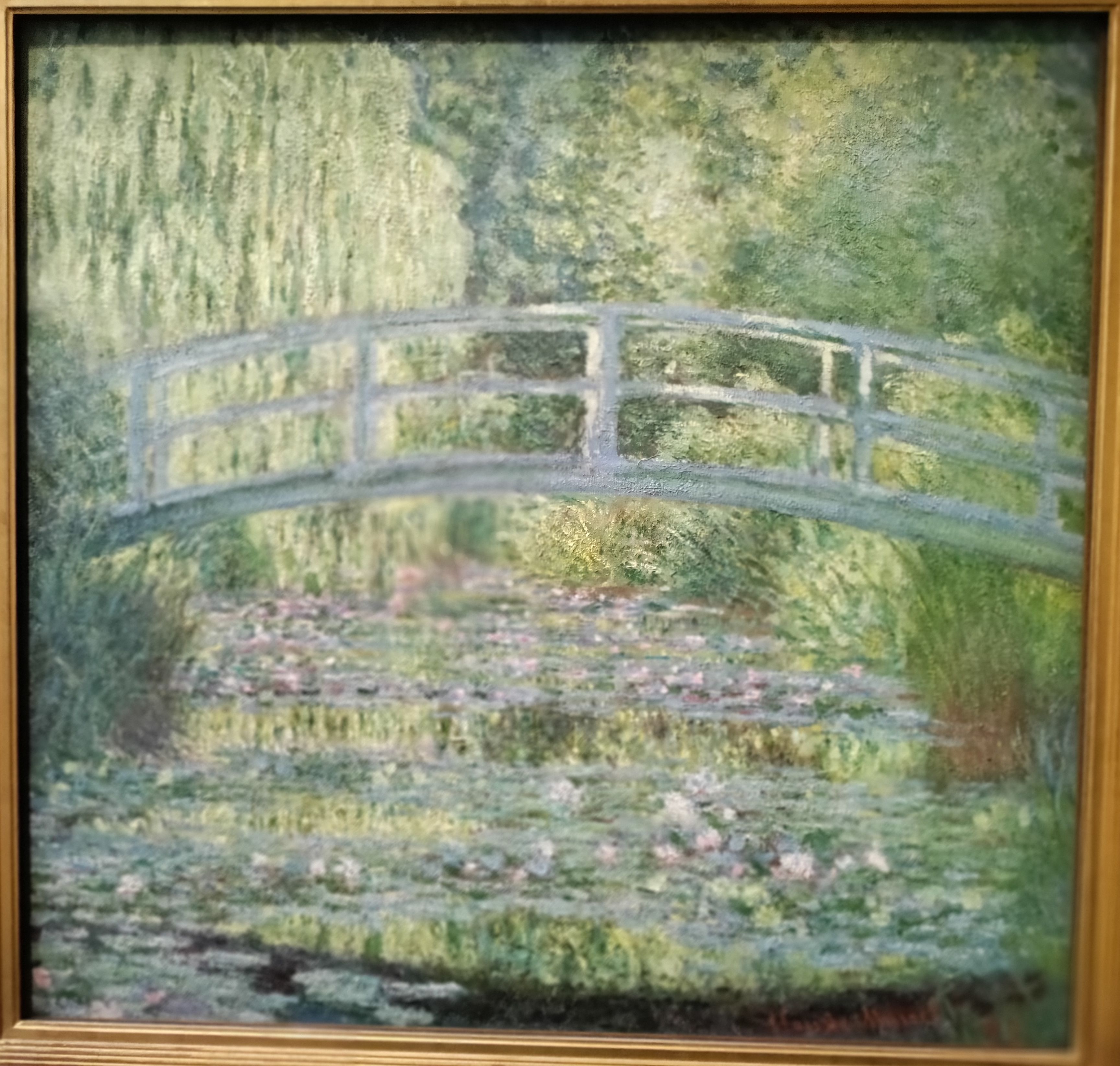 The Water Lily Pond painted by Claude Monet in 1899.
